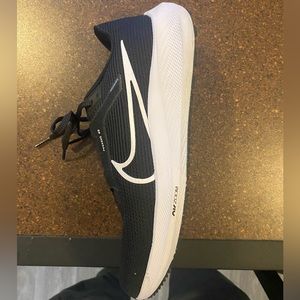 Black and white Nike running shoes